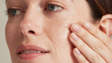 Woman using Hyaluronic Acid skincare